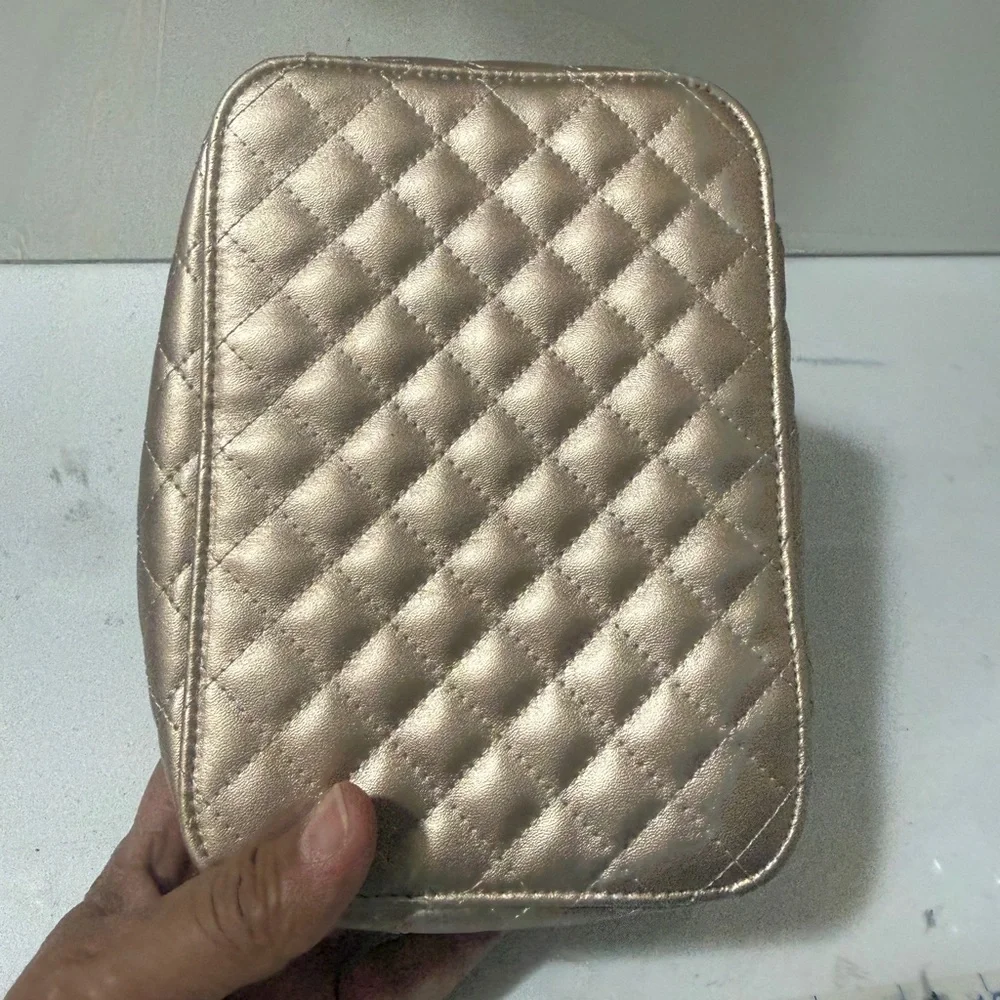 Trish McEvoy Makeup Planner.Quilted Metallic Rose Gold Travel Jewelry and makeup